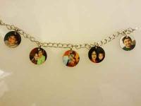 Unisub Charm Bracelet.
Came out really nice and you are still able to see the pics on the char
